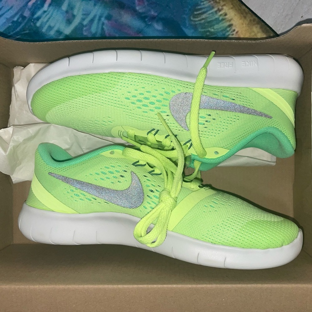 Yellow/ green Nike running shoes